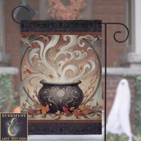 a black and white vase with leaves on it